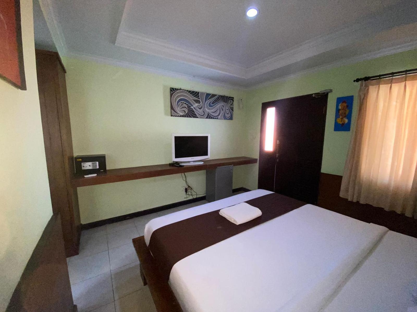 Dedy Beach Inn Кута Екстер'єр фото